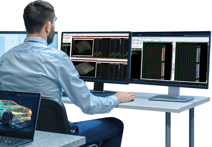 Man in front of monitors
